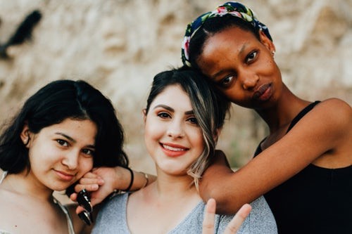 pay not a priority for women group of women smiling
