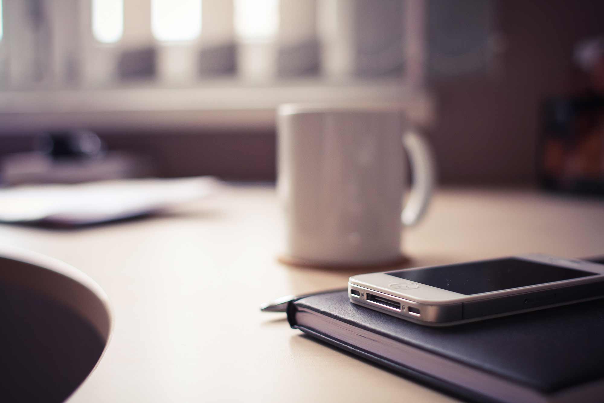 Coffee, phone and notebook